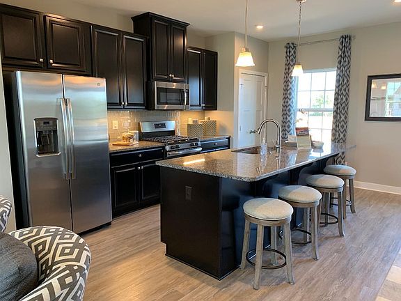 Upgraded kitchen with grainer and hard floor