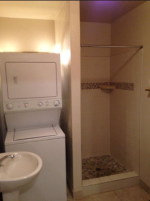 Bathroom with washer and dryer