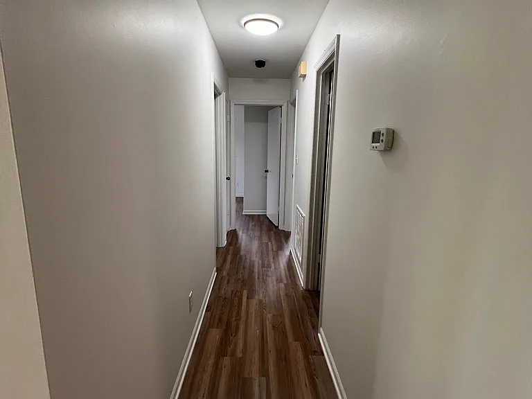 Main hall to rooms and full bath