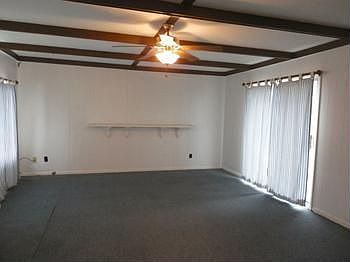 Family room with access to brick patio in back