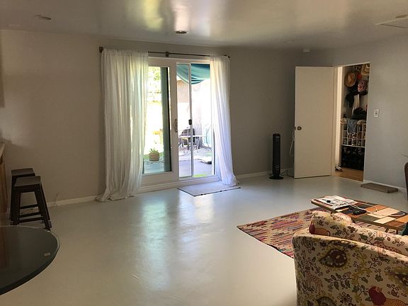 Dining area/living room looking towards backyard