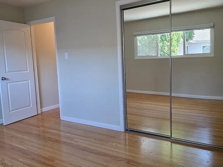 Large Bedroom looking towards the door.