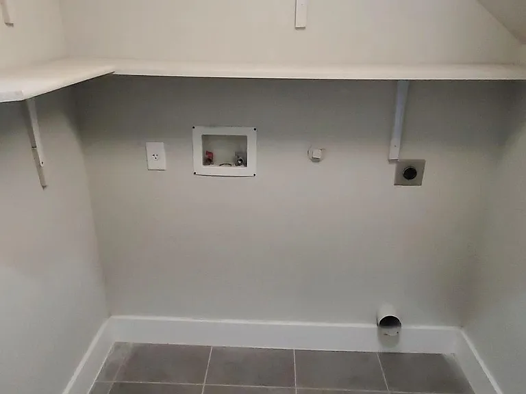 Full sized utility room for washer/dryer on ground floor