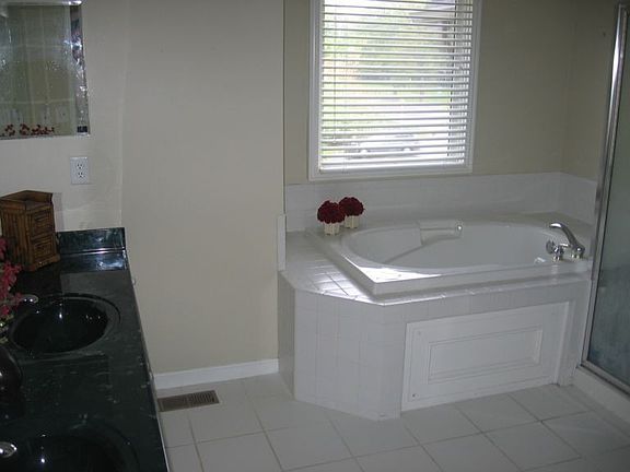 m/bath with garden tub, dual sinks and ext shower