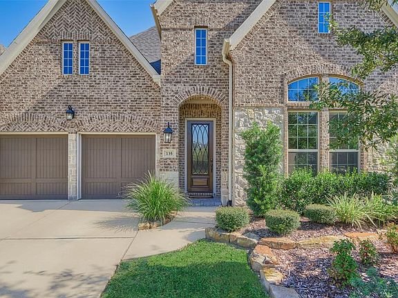 Gorgeous Brick and stone elevation with great curb appeal and a beautiful 8 ft wrought iron door! The home has a large 3 car garage with workbench and epoxy floors keep all that dust away!