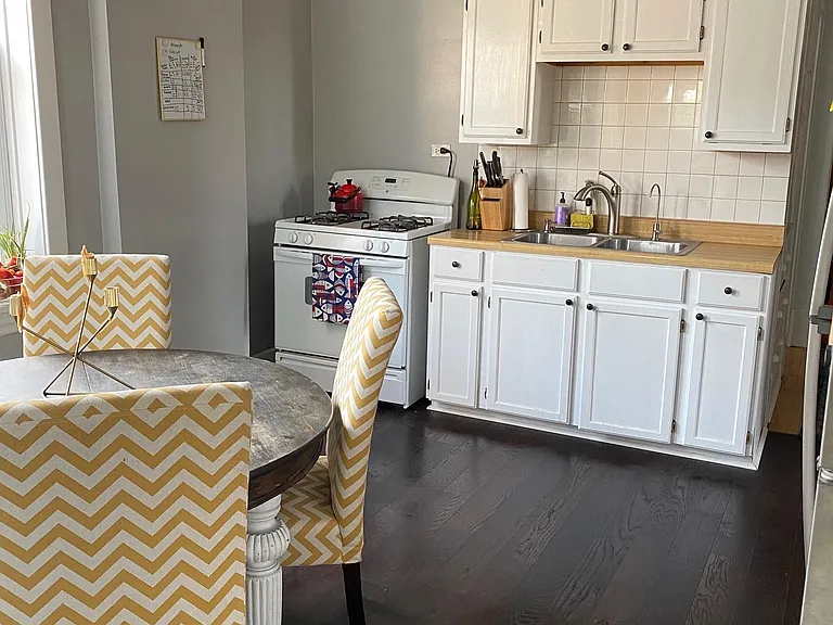 New flooring and freshly painted cabinets