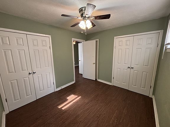 bedroom has his and hers closets