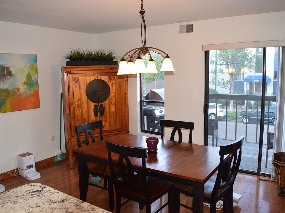 Kitchen opens to dining room with terrace
