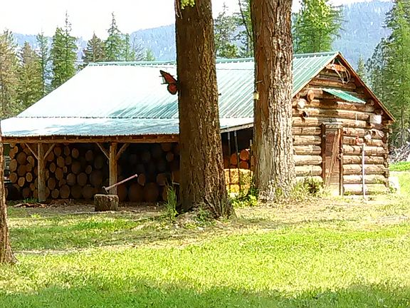 Log Woodshed and Log Barn
