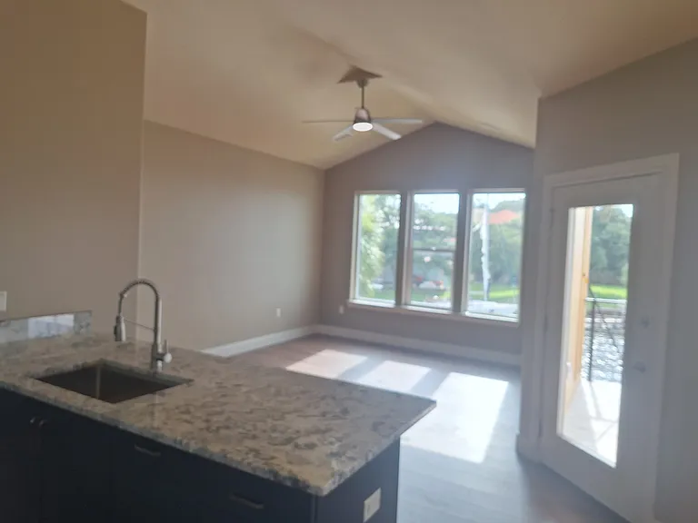 Open floor plan Living Room, Kitchen, and Dining Room