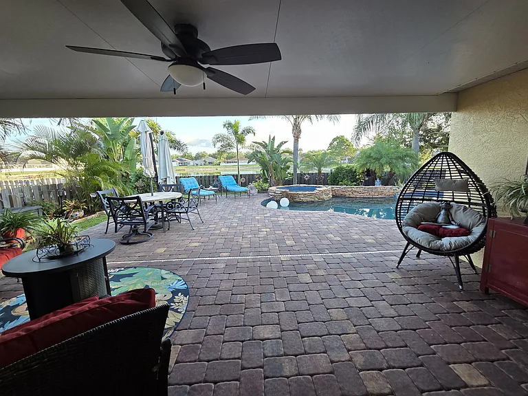 View of the pool from living room sliders