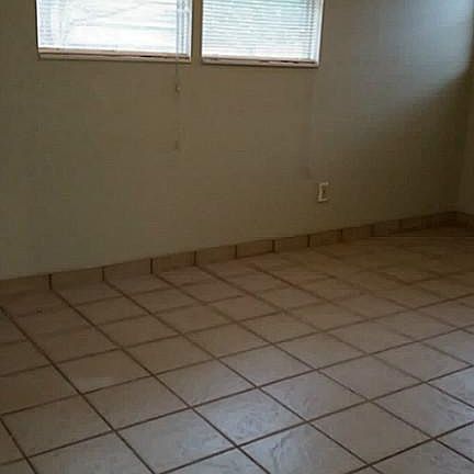Ceramic tile throughout the home.