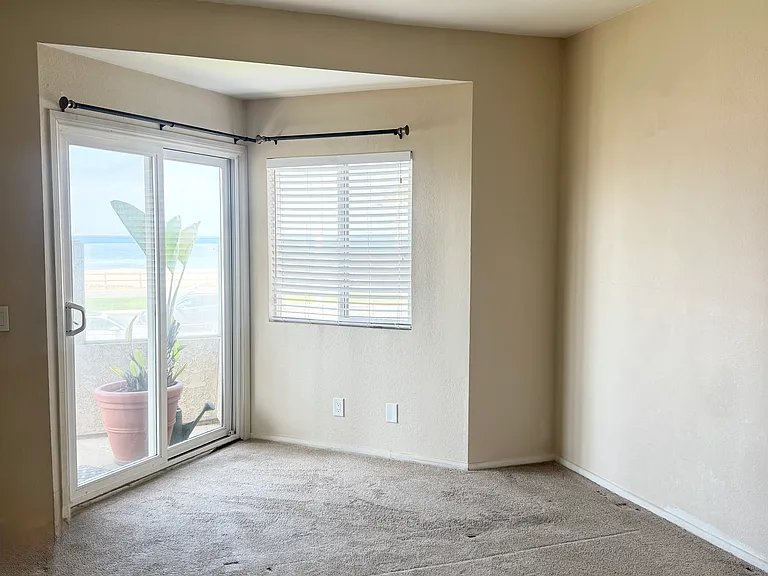 Primary bedroom with private patio