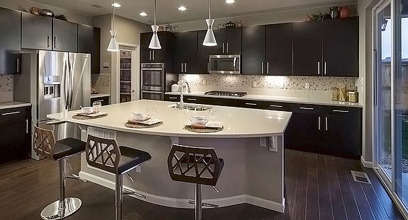 The kitchen is functional and stylish complete  wi