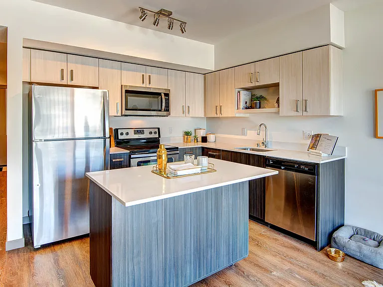 Kitchen with Quartz Countertops and Stainless Steel Appliances