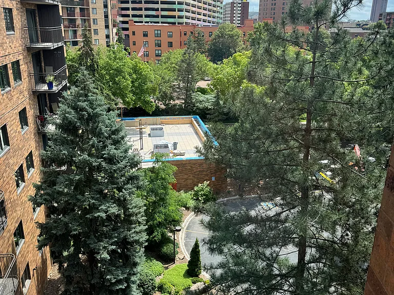 View of community sun deck in the distance.