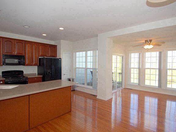 Spacious kitchen with island and breakfast room.