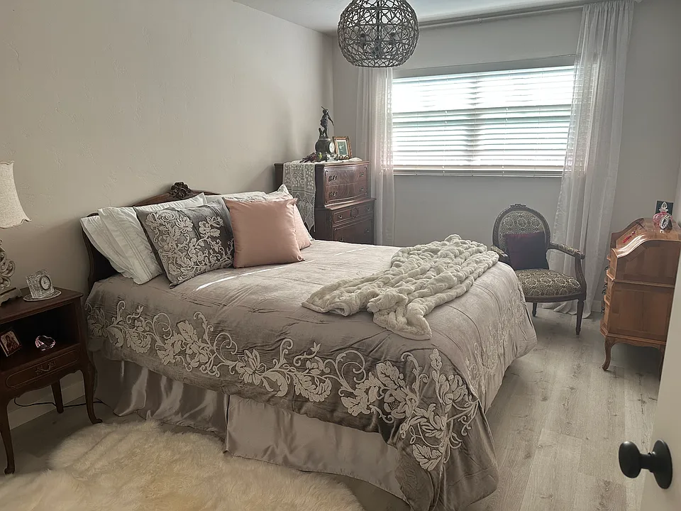 Primary with furnishings, furnishings are not part of the rental agreement. This photo is of the unit directly below but is fairly representative of the newly remodeled unit upstairs. The work is almost completed includes slider with view balcony.