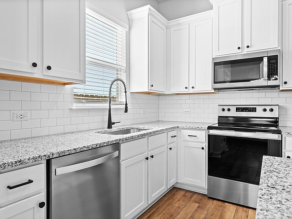 The kitchen has energy efficient appliances.