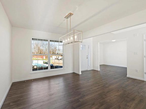 View from dining room covering the front entrance and the office room