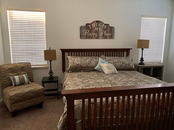 Beautiful Master Bedroom with king size bed, TV, walk in closet, separate tub and shower