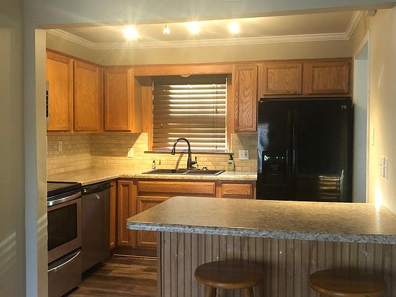 Kitchen with Island open to the living room