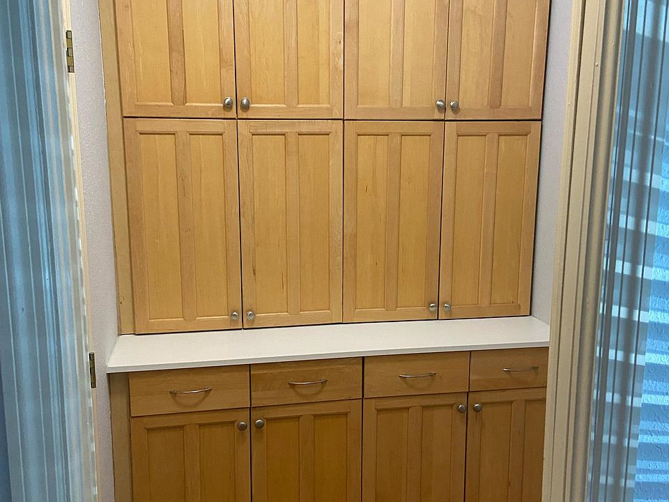 Second closet with lots of cabinetry and drawer storage.