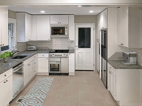 Brand new kitchen. SS appliances, granite countertops, gas cooking, soft close drawers and cabinets.