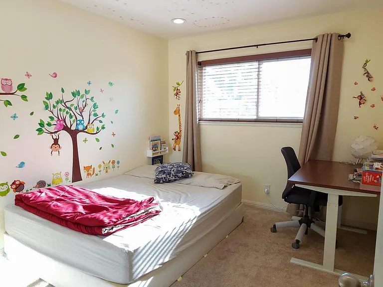 Bedroom3 with carpets before which have now been replaced with wooden flooring
