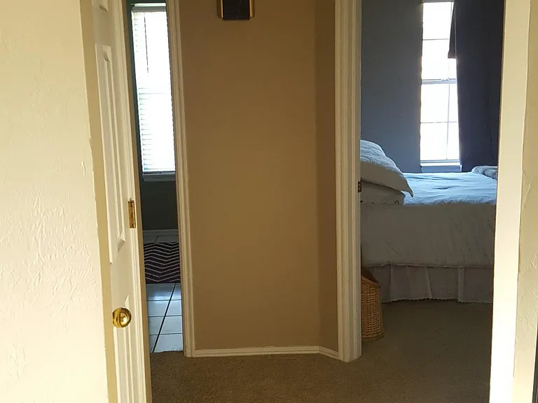 Hallway to guest bedrooms and bath
