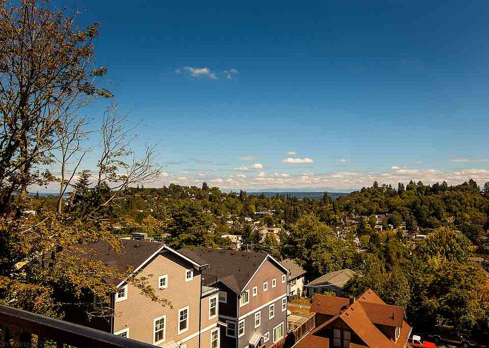 Greet the sunrise over the Cascades from your private deck off your top floor Master Suite! This isn't just about living in Madison Valley, it's about seeing the valley!