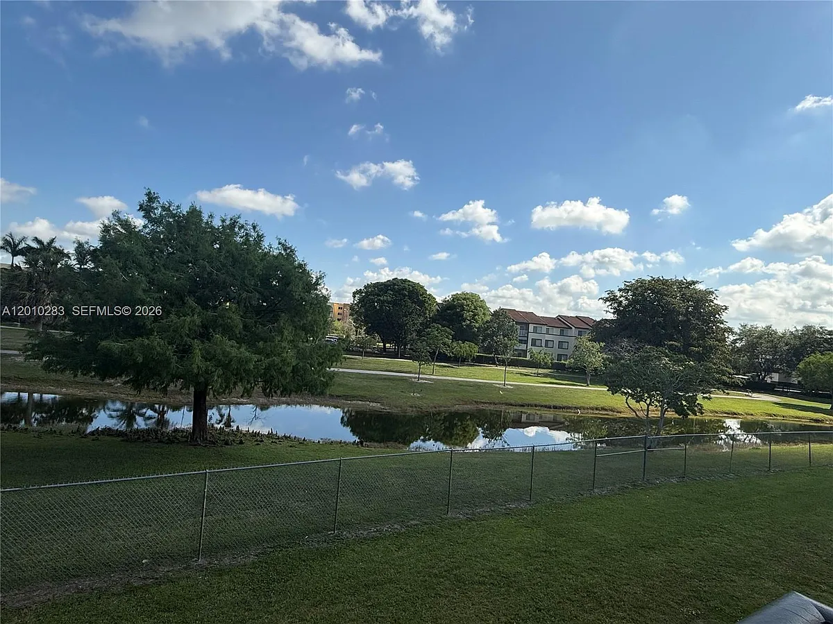 Building Photo - 7195 NW 179th St #211