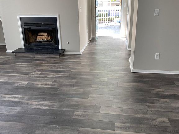 Gas fireplace and wired for wall mounted television.