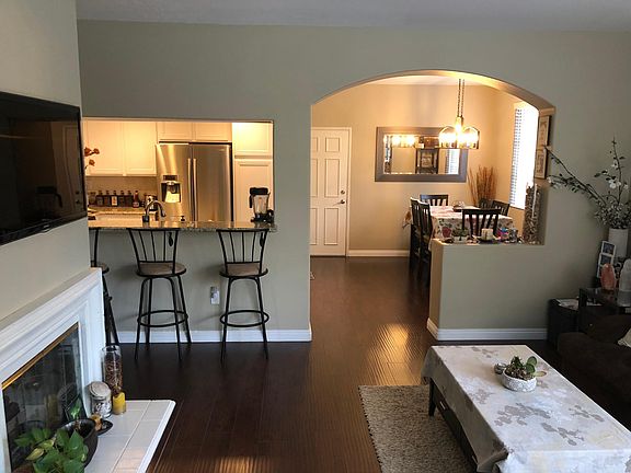 Living room looking into kitchen and dinning room
