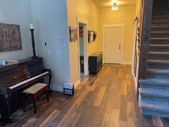 Entry area with door leading to the garage.