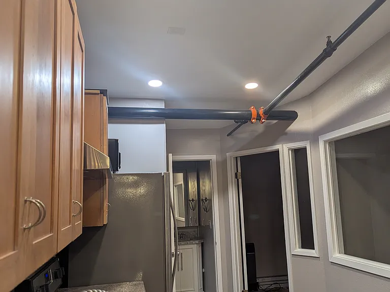 Kitchen & laundry room to back right