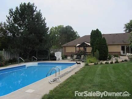Backyard with swimming pool/diving board
