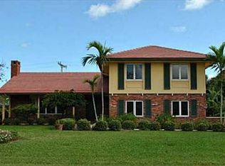 264 N Country Club Dr, Atlantis, FL 33462