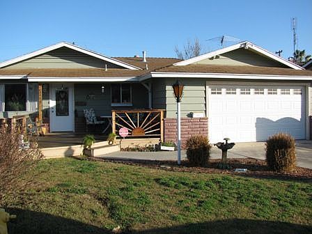 Front has beautiful deck for you to enjoy your morning paper on.