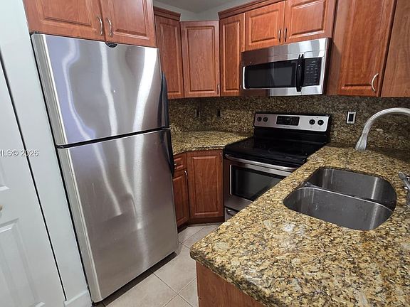 5th image of 6515 W 26th Dr APT 12-38