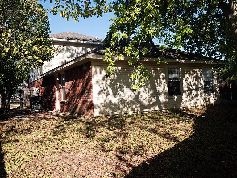 Back of house from corner of backyard