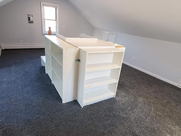 The finished attic makes a great office away from the noise, or a dream bedroom for a kid.