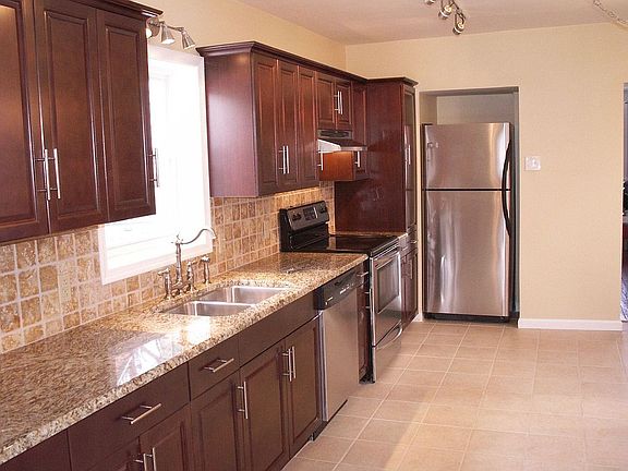 Brand new kitchen with Granite countertop and Stainless steel appliances