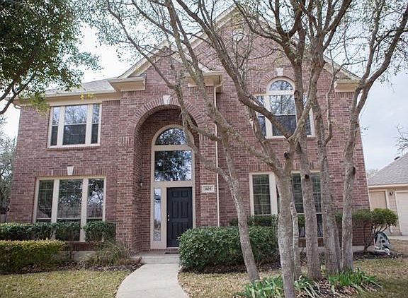 Beautiful curb appeal with great trees.