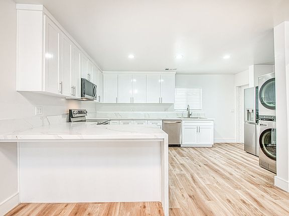 Luxury Kitchen & Appliances, LVP Flooring, Quartz Countertops, Central Heating & Cooling, New Windows.