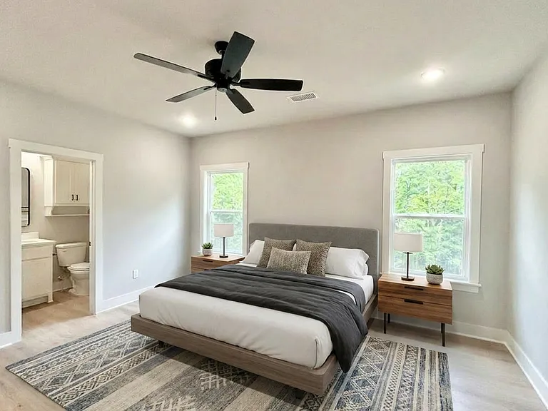 Spacious master bedroom and bath filled with natural light.