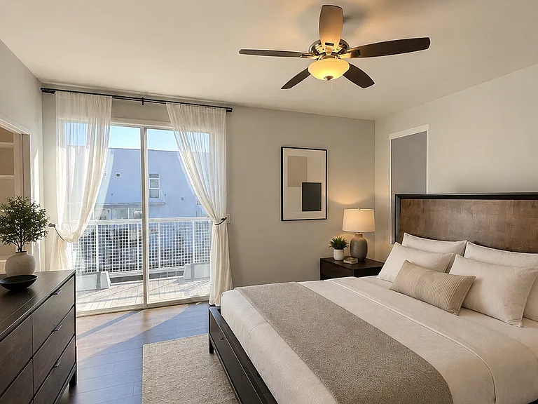 L2 - Primary Bedroom with Balcony.
Virtual staging shown. Furniture not included except bed frame and dresser.