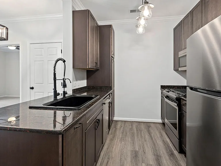 Kitchen with reverse osmosis water filter and separate faucet