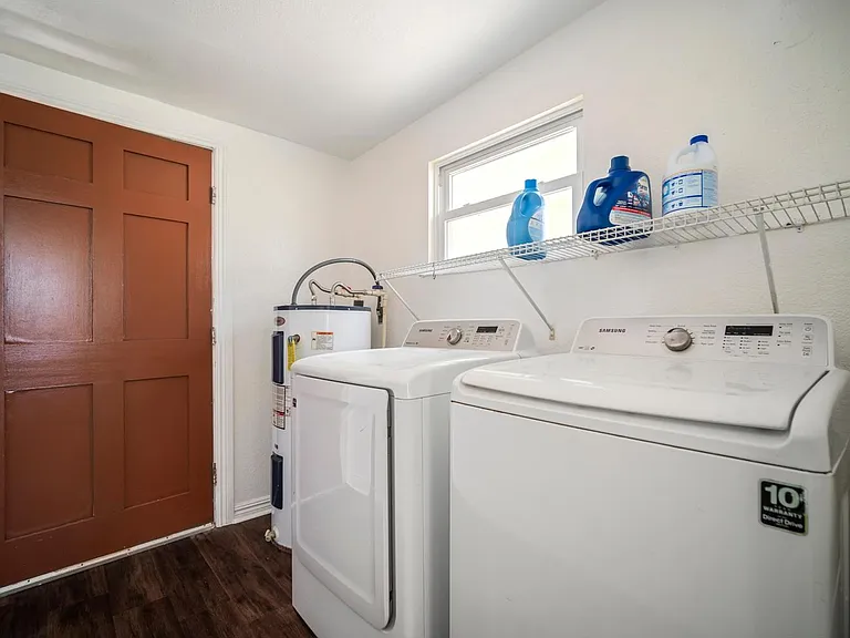 Laundery space and rear door.