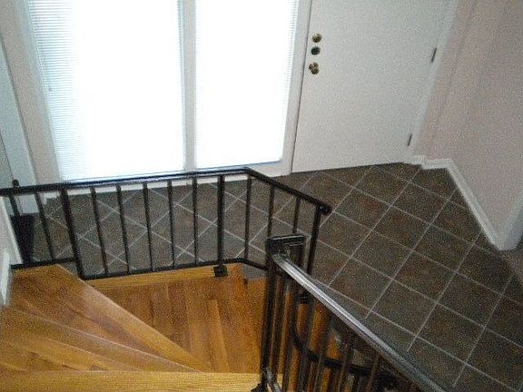 2 Story Foyer with Hardwood Steps